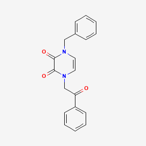 molecular formula C19H16N2O3 B2616060 1-Benzyl-4-phenacylpyrazine-2,3-dione CAS No. 2320577-24-8