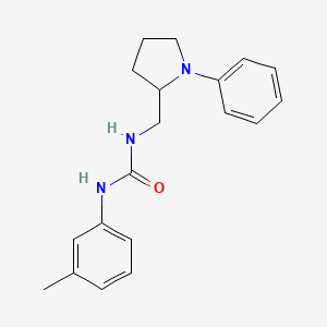 B2616353 1-((1-Phenylpyrrolidin-2-yl)methyl)-3-(m-tolyl)urea CAS No. 1797643-38-9