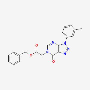 molecular formula C20H17N5O3 B2617573 2-[3-(3-甲基苯基)-7-氧代三唑并[4,5-d]嘧啶-6-基]乙酸苄酯 CAS No. 893938-00-6