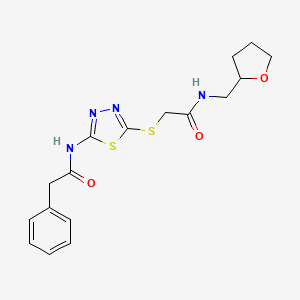 molecular formula C17H20N4O3S2 B2618493 N-(5-((2-oxo-2-(((tetrahydrofuran-2-yl)methyl)amino)ethyl)thio)-1,3,4-thiadiazol-2-yl)-2-phenylacetamide CAS No. 868974-85-0