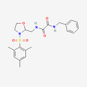 molecular formula C22H27N3O5S B2618577 N1-benzyl-N2-((3-(mesitylsulfonyl)oxazolidin-2-yl)methyl)oxalamide CAS No. 868982-62-1