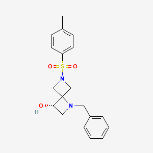 molecular formula C19H22N2O3S B2618649 (3S)-1-Benzyl-6-(4-methylphenyl)sulfonyl-1,6-diazaspiro[3.3]heptan-3-ol CAS No. 1349199-70-7