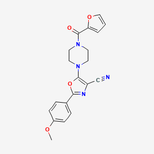 5-(4-(Furan-2-carbonyl)piperazin-1-yl)-2-(4-methoxyphenyl)oxazole-4-carbonitrile