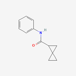 molecular formula C12H13NO B2620249 (Phenylcarbamoyl)spiropentane CAS No. 17202-68-5