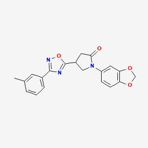 molecular formula C20H17N3O4 B2621038 1-(1,3-Benzodioxol-5-yl)-4-[3-(3-methylphenyl)-1,2,4-oxadiazol-5-yl]-2-pyrrolidinone CAS No. 946330-78-5