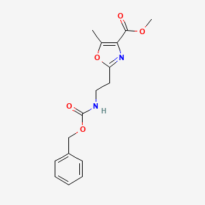 molecular formula C16H18N2O5 B2621536 Methyl 2-(2-{[(benzyloxy)carbonyl]amino}ethyl)-5-methyl-1,3-oxazole-4-carboxylate CAS No. 1418126-03-0