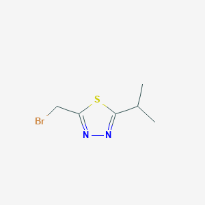 molecular formula C6H9BrN2S B2622880 2-(Bromomethyl)-5-(propan-2-yl)-1,3,4-thiadiazole CAS No. 1566864-54-7