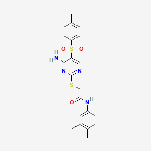 molecular formula C21H22N4O3S2 B2623058 2-({4-amino-5-[(4-methylphenyl)sulfonyl]pyrimidin-2-yl}thio)-N-(3,4-dimethylphenyl)acetamide CAS No. 894952-31-9