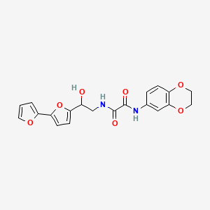 molecular formula C20H18N2O7 B2624694 N-(2-{[2,2'-bifuran]-5-yl}-2-hydroxyethyl)-N'-(2,3-dihydro-1,4-benzodioxin-6-yl)ethanediamide CAS No. 2319848-79-6