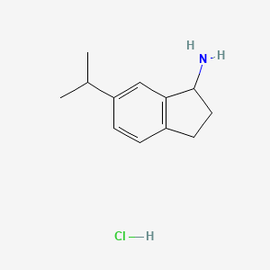molecular formula C12H18ClN B2625223 6-(propan-2-yl)-2,3-dihydro-1H-inden-1-amine hydrochloride CAS No. 1803606-99-6