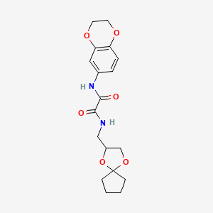 molecular formula C18H22N2O6 B2625290 N1-(1,4-dioxaspiro[4.4]nonan-2-ylmethyl)-N2-(2,3-dihydrobenzo[b][1,4]dioxin-6-yl)oxalamide CAS No. 899982-42-4