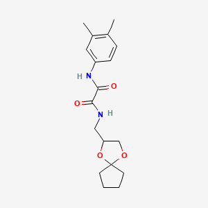 molecular formula C18H24N2O4 B2625701 N1-(1,4-二氧杂螺[4.4]壬烷-2-基甲基)-N2-(3,4-二甲苯基)草酰胺 CAS No. 899734-29-3
