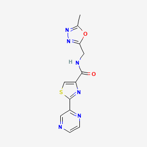 molecular formula C12H10N6O2S B2625747 N-((5-methyl-1,3,4-oxadiazol-2-yl)methyl)-2-(pyrazin-2-yl)thiazole-4-carboxamide CAS No. 1235632-04-8