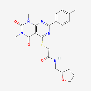 molecular formula C22H25N5O4S B2626267 2-((6,8-dimethyl-5,7-dioxo-2-(p-tolyl)-5,6,7,8-tetrahydropyrimido[4,5-d]pyrimidin-4-yl)thio)-N-((tetrahydrofuran-2-yl)methyl)acetamide CAS No. 872688-38-5