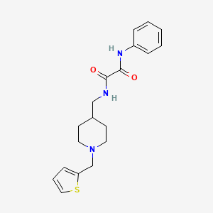 molecular formula C19H23N3O2S B2626575 N1-phenyl-N2-((1-(thiophen-2-ylmethyl)piperidin-4-yl)methyl)oxalamide CAS No. 952981-70-3