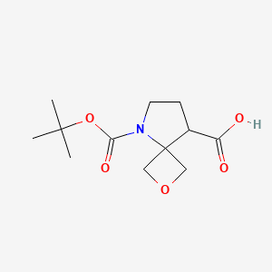 molecular formula C12H19NO5 B2627076 5-[(2-Methylpropan-2-yl)oxycarbonyl]-2-oxa-5-azaspiro[3.4]octane-8-carboxylic acid CAS No. 2248384-55-4