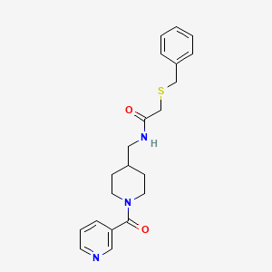 molecular formula C21H25N3O2S B2627202 2-(benzylthio)-N-((1-nicotinoylpiperidin-4-yl)methyl)acetamide CAS No. 1396583-45-1
