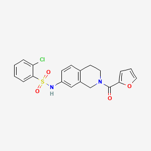 molecular formula C20H17ClN2O4S B2627760 2-chloro-N-(2-(furan-2-carbonyl)-1,2,3,4-tetrahydroisoquinolin-7-yl)benzenesulfonamide CAS No. 955722-64-2