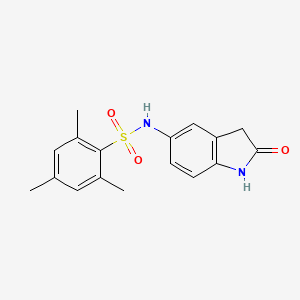 molecular formula C17H18N2O3S B2629827 2,4,6-三甲基-N-(2-氧代吲哚啉-5-基)苯磺酰胺 CAS No. 921812-04-6