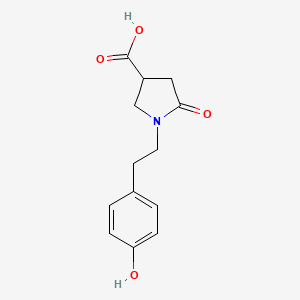 molecular formula C13H15NO4 B2630402 1-[2-(4-Hydroxyphenyl)ethyl]-5-oxopyrrolidine-3-carboxylic acid CAS No. 855496-61-6