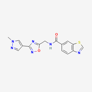 molecular formula C15H12N6O2S B2630844 N-((3-(1-methyl-1H-pyrazol-4-yl)-1,2,4-oxadiazol-5-yl)methyl)benzo[d]thiazole-6-carboxamide CAS No. 2034532-72-2