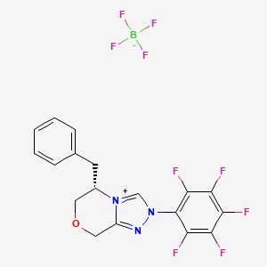 molecular formula C18H13BF9N3O B2632360 (S)-5-benzyl-2-(perfluorophenyl)-2,5,6,8-tetrahydro-[1,2,4]triazolo[3,4-c][1,4]oxazin-4-ium tetrafluoroborate CAS No. 1327274-33-8