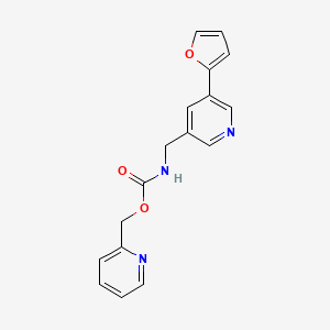 molecular formula C17H15N3O3 B2632693 Pyridin-2-ylmethyl ((5-(furan-2-yl)pyridin-3-yl)methyl)carbamate CAS No. 2034315-50-7