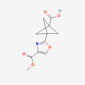 molecular formula C11H11NO5 B2633554 3-[4-(Methoxycarbonyl)-1,3-oxazol-2-yl]bicyclo[1.1.1]pentane-1-carboxylic acid CAS No. 1980053-58-4