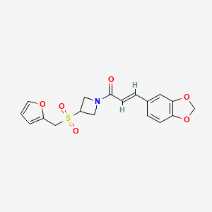 molecular formula C18H17NO6S B2633568 (E)-3-(苯并[d][1,3]二氧杂环-5-基)-1-(3-((呋喃-2-基甲基)磺酰基)氮杂环丁-1-基)丙-2-烯-1-酮 CAS No. 1798418-48-0