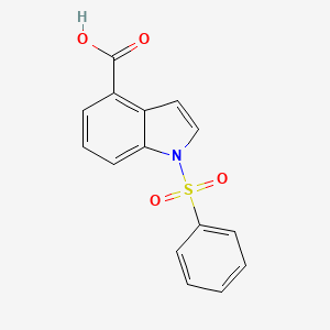 molecular formula C15H11NO4S B2633764 1-Benzenesulfonyl-1H-indole-4-carboxylic acid CAS No. 1356470-08-0