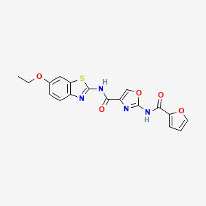 molecular formula C18H14N4O5S B2633794 N-(6-乙氧基苯并[d]噻唑-2-基)-2-(呋喃-2-甲酰胺基)恶唑-4-甲酰胺 CAS No. 1286709-50-9
