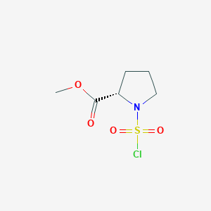 molecular formula C6H10ClNO4S B2634137 L-Proline, 1-(chlorosulfonyl)-, methyl ester CAS No. 159525-92-5