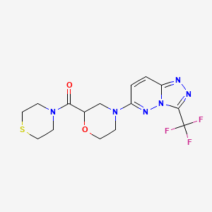 molecular formula C15H17F3N6O2S B2634433 Thiomorpholin-4-yl-[4-[3-(trifluoromethyl)-[1,2,4]triazolo[4,3-b]pyridazin-6-yl]morpholin-2-yl]methanone CAS No. 2415509-14-5