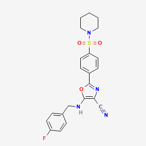 molecular formula C22H21FN4O3S B2635014 5-[(4-Fluorobenzyl)amino]-2-[4-(piperidin-1-ylsulfonyl)phenyl]-1,3-oxazole-4-carbonitrile CAS No. 941243-59-0