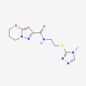 molecular formula C12H16N6O2S B2635212 N-(2-((4-methyl-4H-1,2,4-triazol-3-yl)thio)ethyl)-6,7-dihydro-5H-pyrazolo[5,1-b][1,3]oxazine-2-carboxamide CAS No. 1448077-37-9