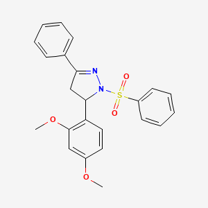 molecular formula C23H22N2O4S B2635318 5-(2,4-dimethoxyphenyl)-3-phenyl-1-(phenylsulfonyl)-4,5-dihydro-1H-pyrazole CAS No. 402951-54-6