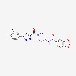 N-{1-[1-(3,4-dimethylphenyl)-1H-1,2,3-triazole-4-carbonyl]piperidin-4-yl}-2H-1,3-benzodioxole-5-carboxamide