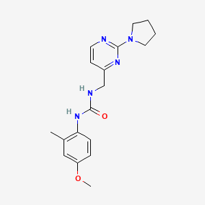 1-(4-Methoxy-2-methylphenyl)-3-((2-(pyrrolidin-1-yl)pyrimidin-4-yl)methyl)urea