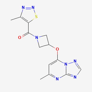 molecular formula C13H13N7O2S B2636745 4-Methyl-5-[3-({5-methyl-[1,2,4]triazolo[1,5-a]pyrimidin-7-yl}oxy)azetidine-1-carbonyl]-1,2,3-thiadiazole CAS No. 2097858-97-2