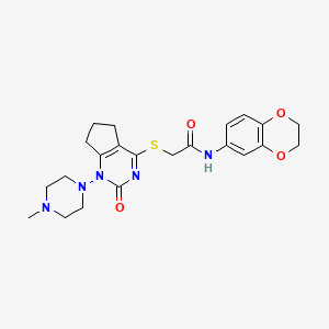 molecular formula C22H27N5O4S B2637256 N-(2,3-dihydrobenzo[b][1,4]dioxin-6-yl)-2-((1-(4-methylpiperazin-1-yl)-2-oxo-2,5,6,7-tetrahydro-1H-cyclopenta[d]pyrimidin-4-yl)thio)acetamide CAS No. 899992-92-8