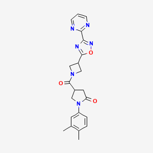 1-(3,4-Dimethylphenyl)-4-(3-(3-(pyrimidin-2-yl)-1,2,4-oxadiazol-5-yl)azetidine-1-carbonyl)pyrrolidin-2-one