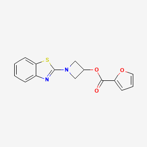molecular formula C15H12N2O3S B2638253 1-(苯并[d]噻唑-2-基)氮杂环丁-3-基呋喃-2-羧酸酯 CAS No. 1421531-17-0