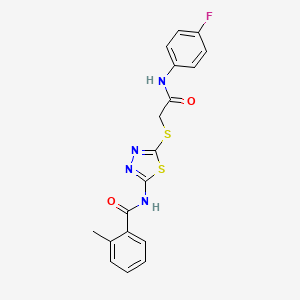 molecular formula C18H15FN4O2S2 B2639759 N-[5-[2-(4-fluoroanilino)-2-oxoethyl]sulfanyl-1,3,4-thiadiazol-2-yl]-2-methylbenzamide CAS No. 392297-52-8