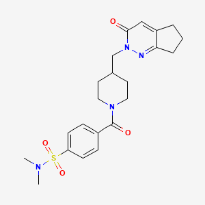 molecular formula C22H28N4O4S B2640034 N,N-Dimethyl-4-[4-[(3-oxo-6,7-dihydro-5H-cyclopenta[c]pyridazin-2-yl)methyl]piperidine-1-carbonyl]benzenesulfonamide CAS No. 2310128-55-1
