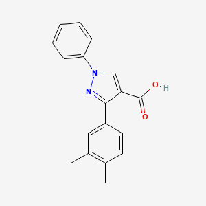 molecular formula C18H16N2O2 B2642327 3-(3,4-dimethylphenyl)-1-phenyl-1H-pyrazole-4-carboxylic acid CAS No. 956753-11-0