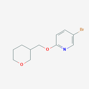 5-Bromo-2-[(oxan-3-yl)methoxy]pyridine
