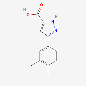 molecular formula C12H12N2O2 B2645326 3-(3,4-dimethylphenyl)-1H-pyrazole-5-carboxylic acid CAS No. 1197631-29-0