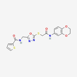 molecular formula C18H16N4O5S2 B2646106 N-((5-((2-((2,3-dihydrobenzo[b][1,4]dioxin-6-yl)amino)-2-oxoethyl)thio)-1,3,4-oxadiazol-2-yl)methyl)thiophene-2-carboxamide CAS No. 851861-63-7