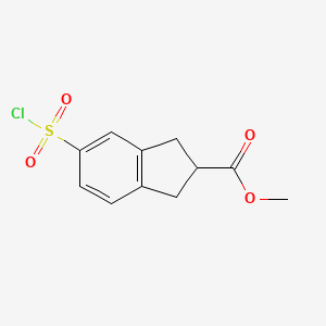molecular formula C11H11ClO4S B2647118 methyl 5-(chlorosulfonyl)-2,3-dihydro-1H-indene-2-carboxylate CAS No. 600166-73-2
