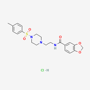 molecular formula C21H26ClN3O5S B2648574 盐酸N-(2-(4-甲苯磺酰哌嗪-1-基)乙基)苯并[d][1,3]二氧杂环-5-甲酰胺 CAS No. 1185131-74-1